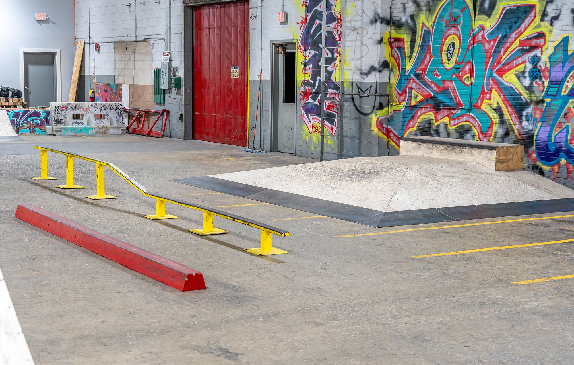 Indoor BMX park image of rail and hip